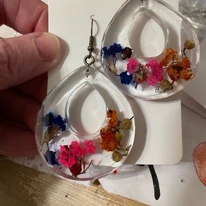 Handmade, customizable resin jewelry. I can do your favorite colors!